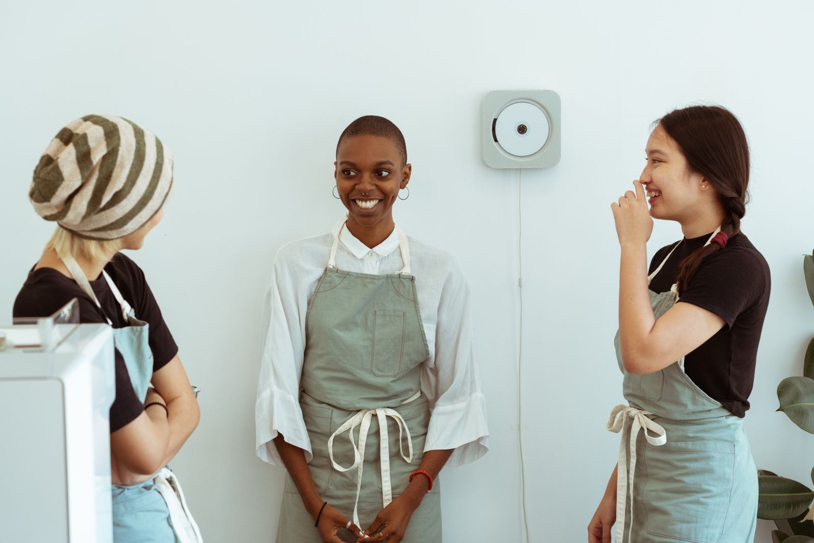 Frontline service workers smiling together at work